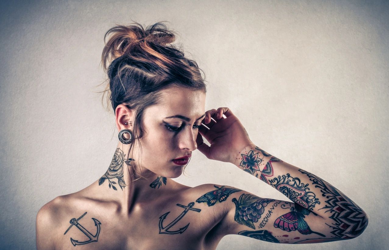 From Peace Signs to Fine Lines: How Tattoo and Piercing Trends Have Changed Over the Decades